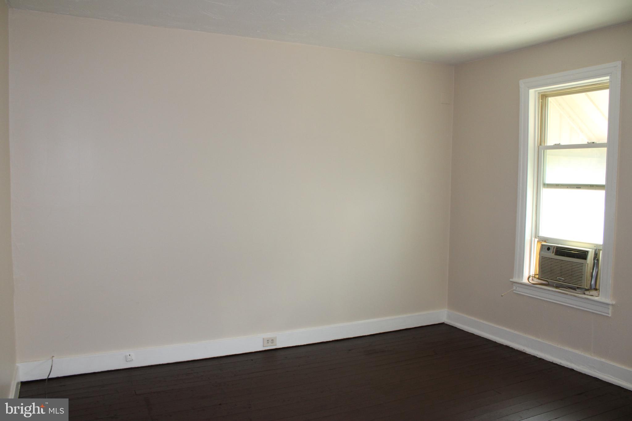 103 West 6th Avenue York, PA 17404 - Photo 6 of 19 an empty room with a window