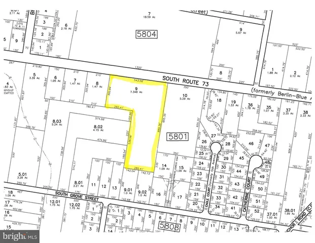 a picture of a bathroom with a window and a shower