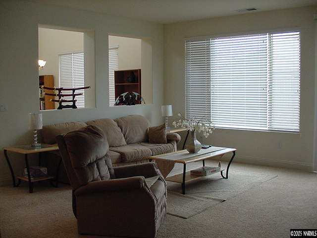 631 Steeplechase Court Reno, NV 89521 - Photo 2 of 8 a living room with furniture and a window