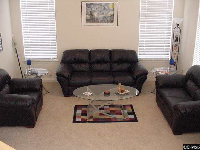 631 Steeplechase Court Reno, NV 89521 - Photo 3 of 8 a living room with furniture and a window