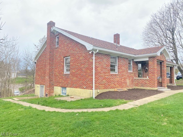 1772 Bantam Ridge Road Steubenville, OH 43953 - Photo 26 of 43 View of property exterior with a lawn