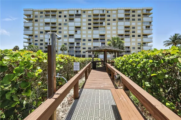 a view of balcony and yard