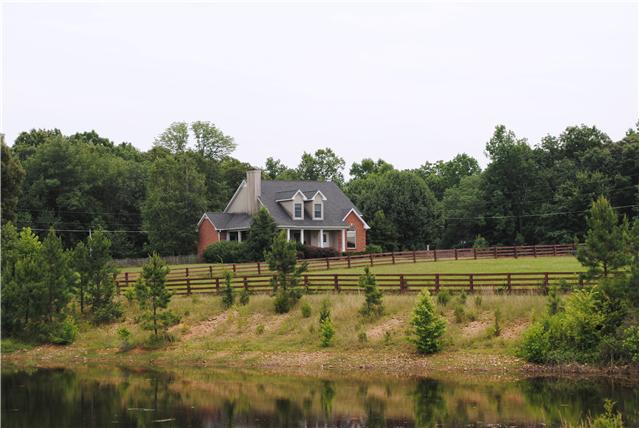 128 MARTIN RD- FANTASTIC HORSE PROPERTY! Gorgeous flat land, pond, fenced and cross-fenced, 5-stall barn, (tack, feed, & hay rooms), det. 3 bay garage plus BSMT Garage. Covered & screened porches. Split BD system, St St appl.