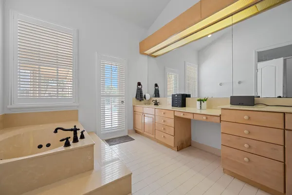 a kitchen with sink cabinets and window