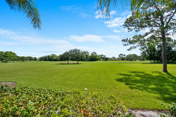 a view of a lake with a big yard
