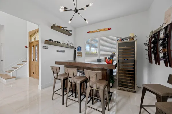 a dinning table and chairs in a room