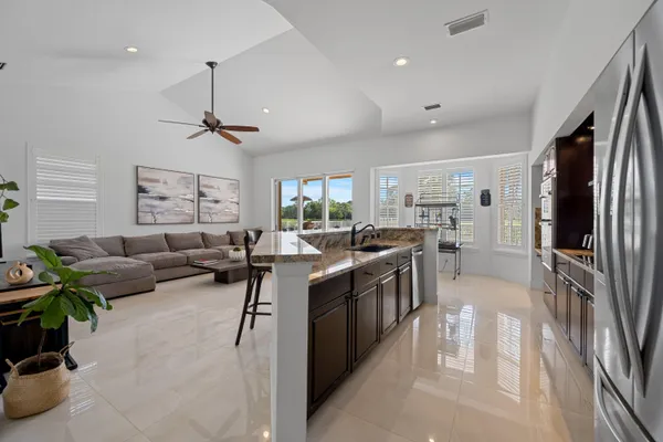 a kitchen with stainless steel appliances lots of counter top space