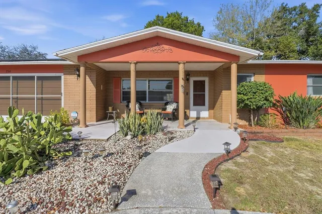front view of a house with a patio