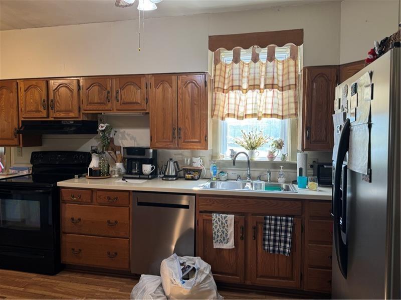 149 South Franklin Street Prospect, PA 16052 - Photo 6 of 25 a kitchen with a window a sink and cabinets