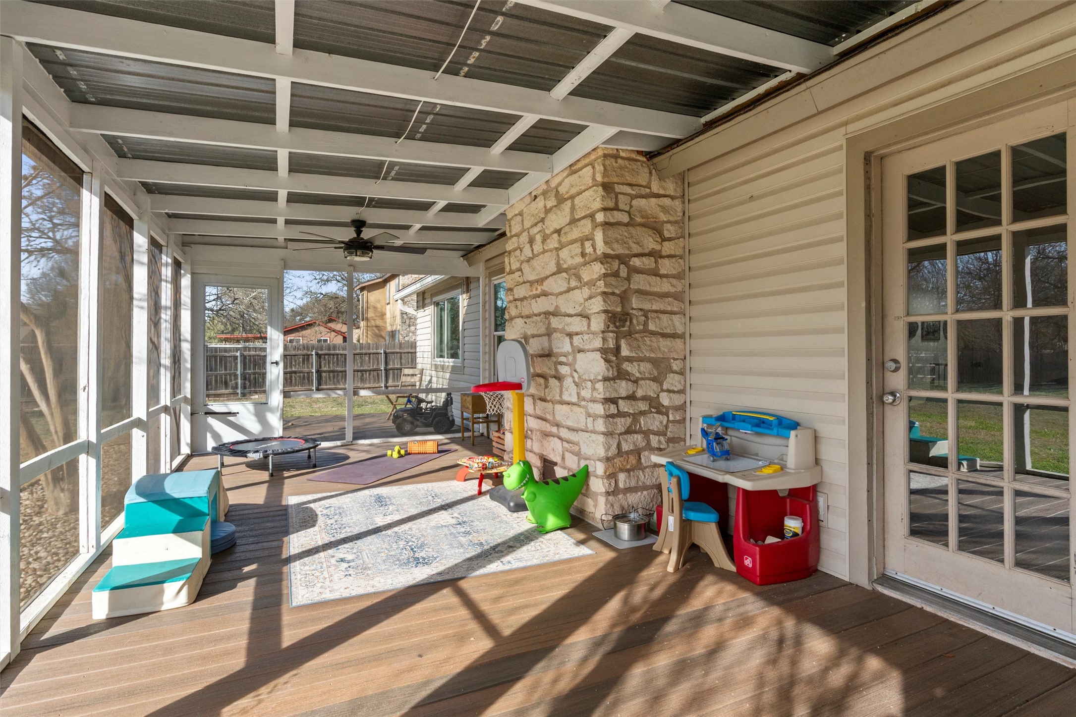 3431 Bliss Spillar Road Manchaca, TX 78652 - Photo 23 of 30 Wooden terrace with a sunroom and a ceiling fan