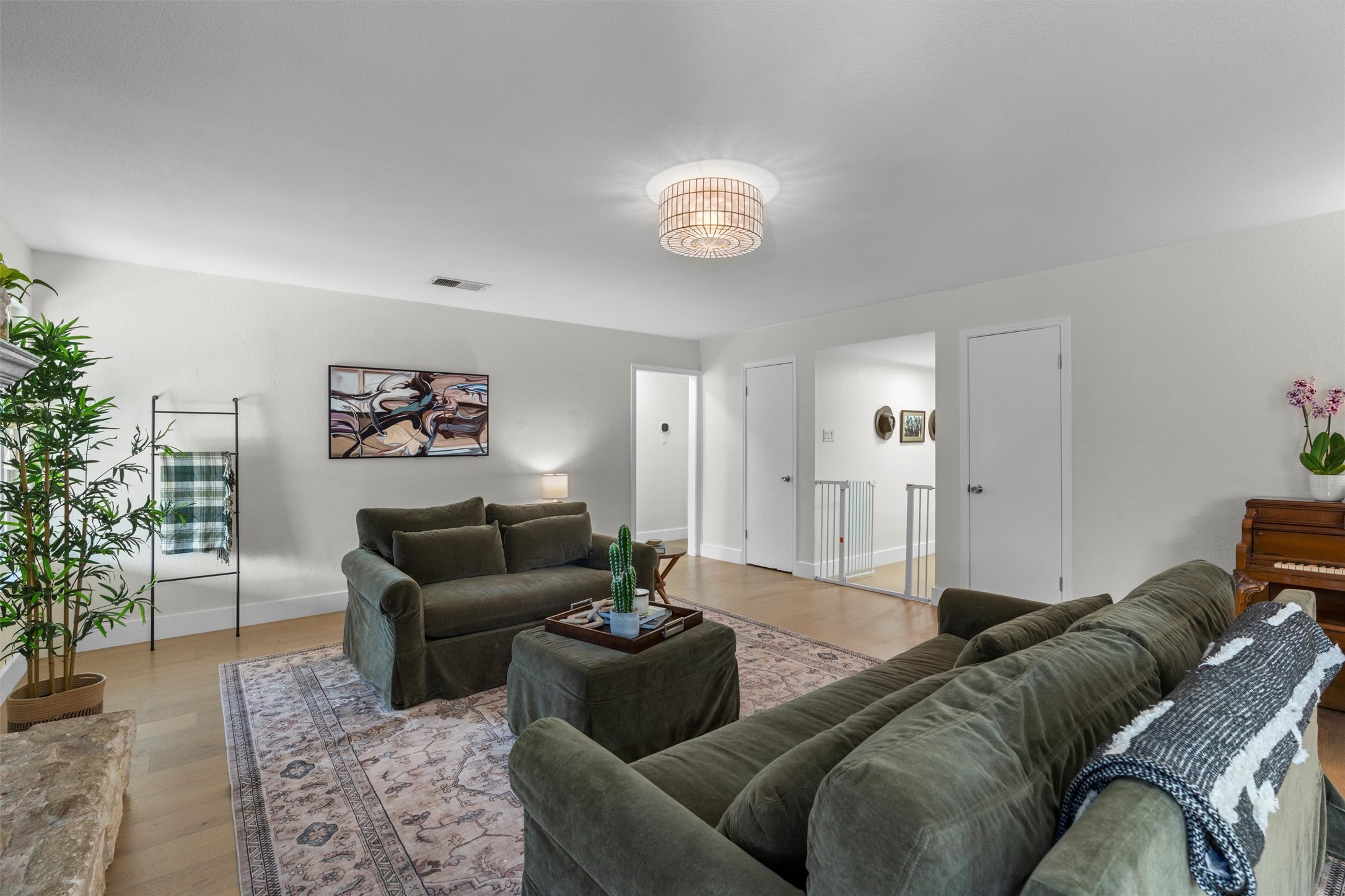 3431 Bliss Spillar Road Manchaca, TX 78652 - Photo 6 of 30 Living room featuring wood finished floors and baseboards