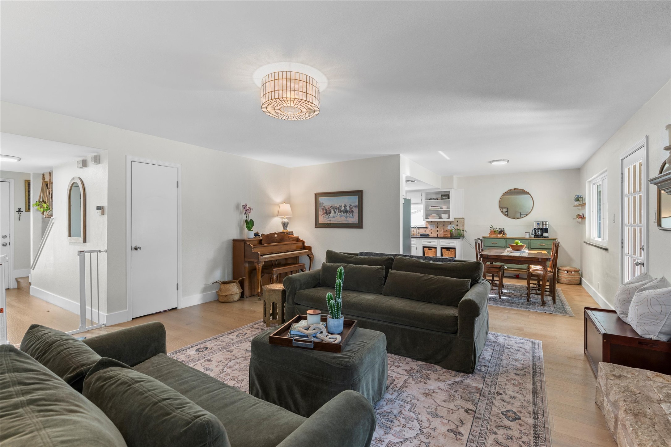 3431 Bliss Spillar Road Manchaca, TX 78652 - Photo 7 of 30 Living area with light wood-style floors and baseboards
