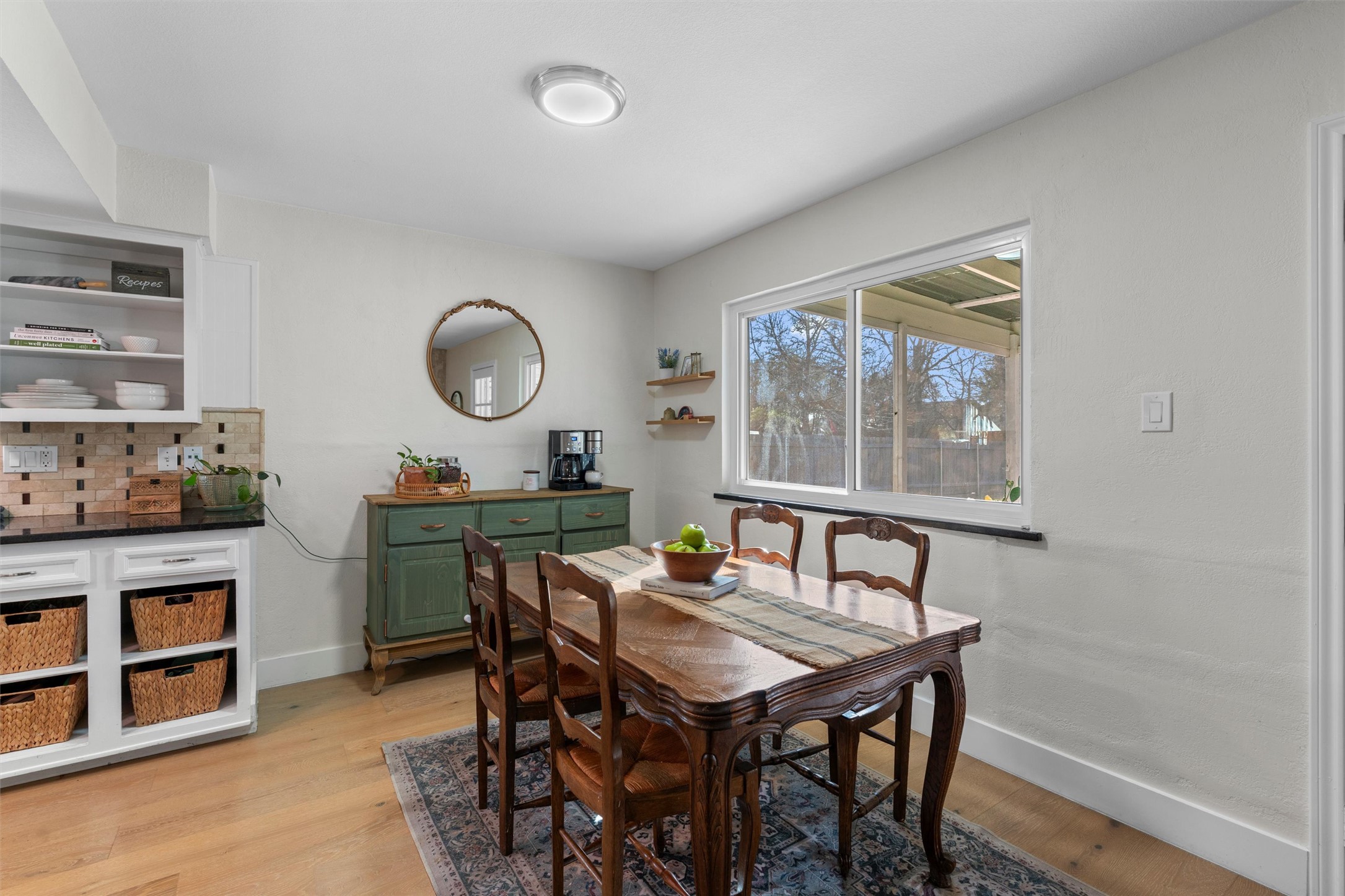 3431 Bliss Spillar Road Manchaca, TX 78652 - Photo 8 of 30 Dining space featuring light wood-style flooring and baseboards