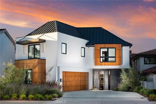 a front view of a house with yard