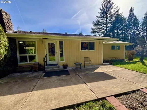 a view of a house with a big yard