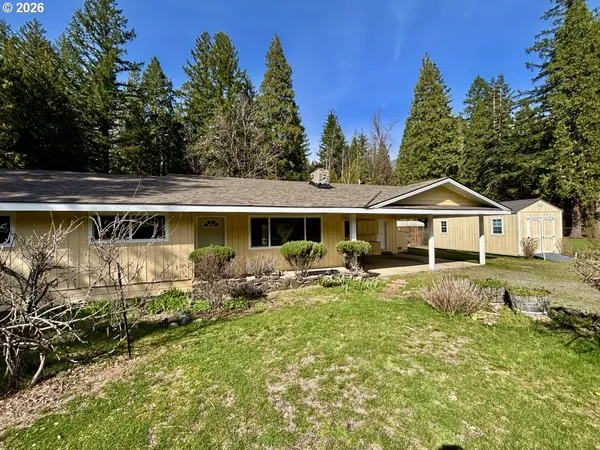 a view of a yard with swimming pool
