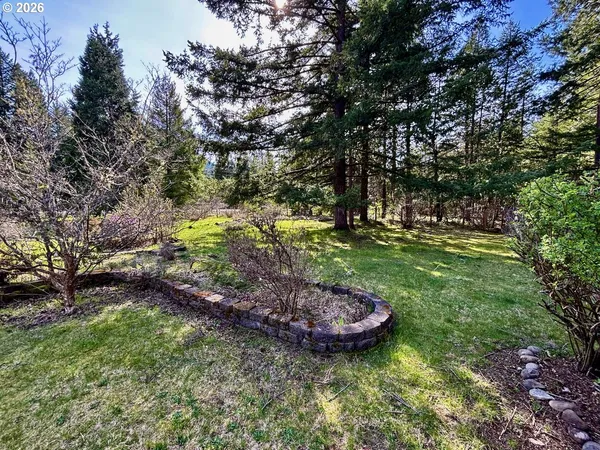 a view of a chairs and table in the patio