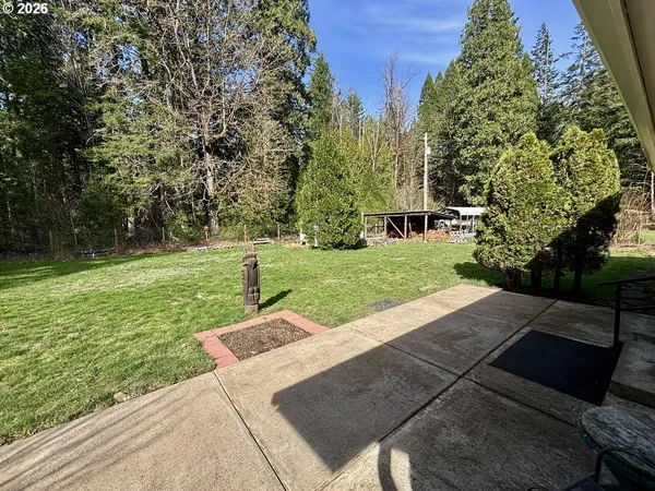 a view of a house with a big yard