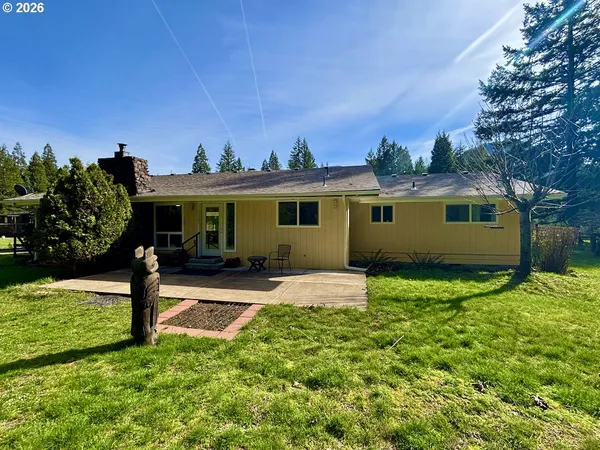 a view of park with a wooden fence