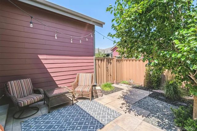 a view of a backyard with a patio