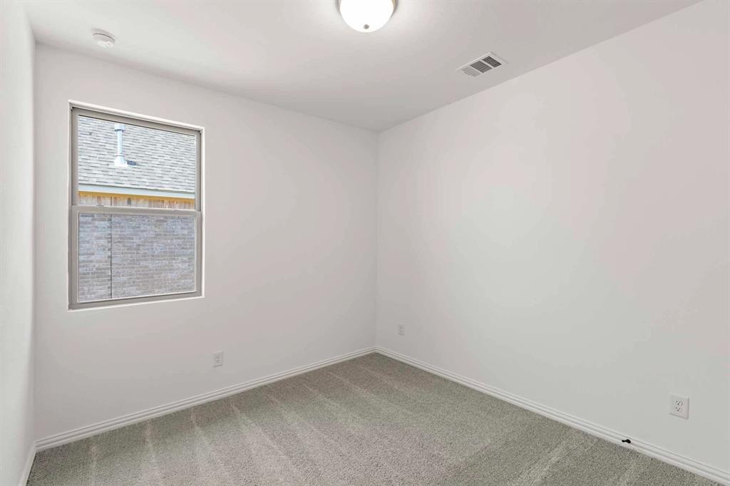 1909 Wishon Road Celina, TX 75009 - Photo 19 of 40 an empty room with windows