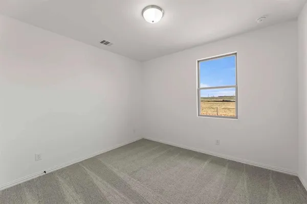 an empty room with a window