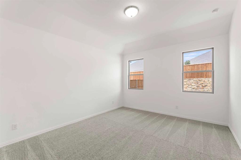 1909 Wishon Road Celina, TX 75009 - Photo 33 of 40 an empty room with windows