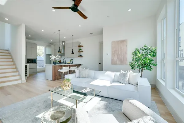 a kitchen with stainless steel appliances a stove sink and cabinets