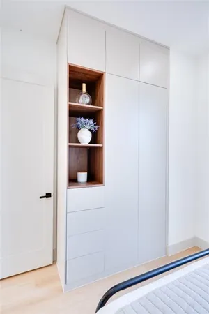 a view of entryway with wooden floor and window