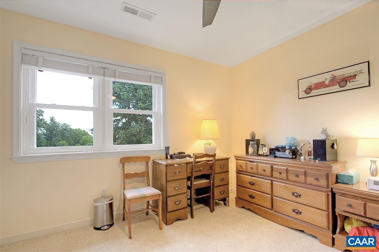 1532 Dairy Road Charlottesville, VA 22903 - Photo 26 of 42 Two additional bedrooms share the upstairs with the master. This room is located on the rear of the home, enjoying wonderful views. All of the bedrooms have ceiling fans for enhanced climate control.