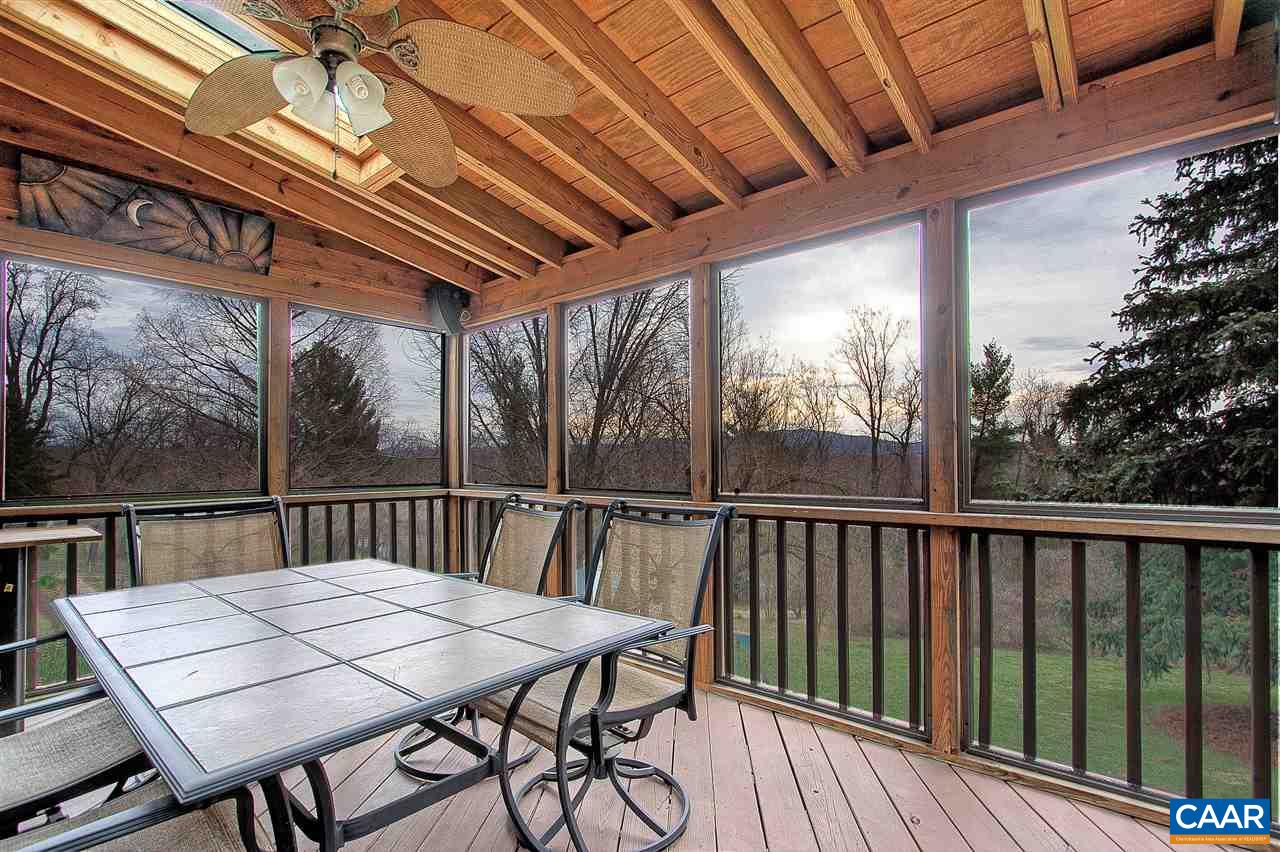 1532 Dairy Road Charlottesville, VA 22903 - Photo 9 of 42 Savor sunrise over the mountains with a morning cup of coffee. Skylights ensure that the screened porch stays light, while a ceiling fan keeps things cool. Individually removable metal framed screens make cleaning & maintenance a breeze.