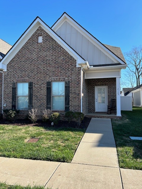 2125 Hospitality Lane Murfreesboro, TN 37128 - Photo 2 of 6 a front view of a house with a yard