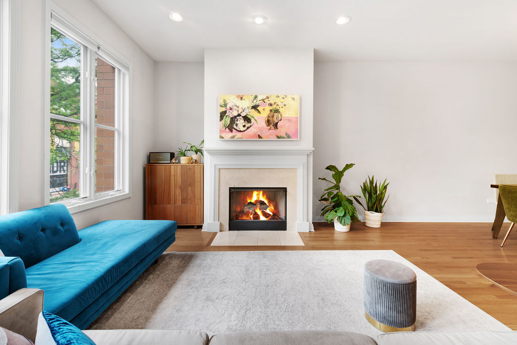 Undisclosed Address Chicago, IL 60607 - Photo 3 of 20 a living room with furniture and a fireplace