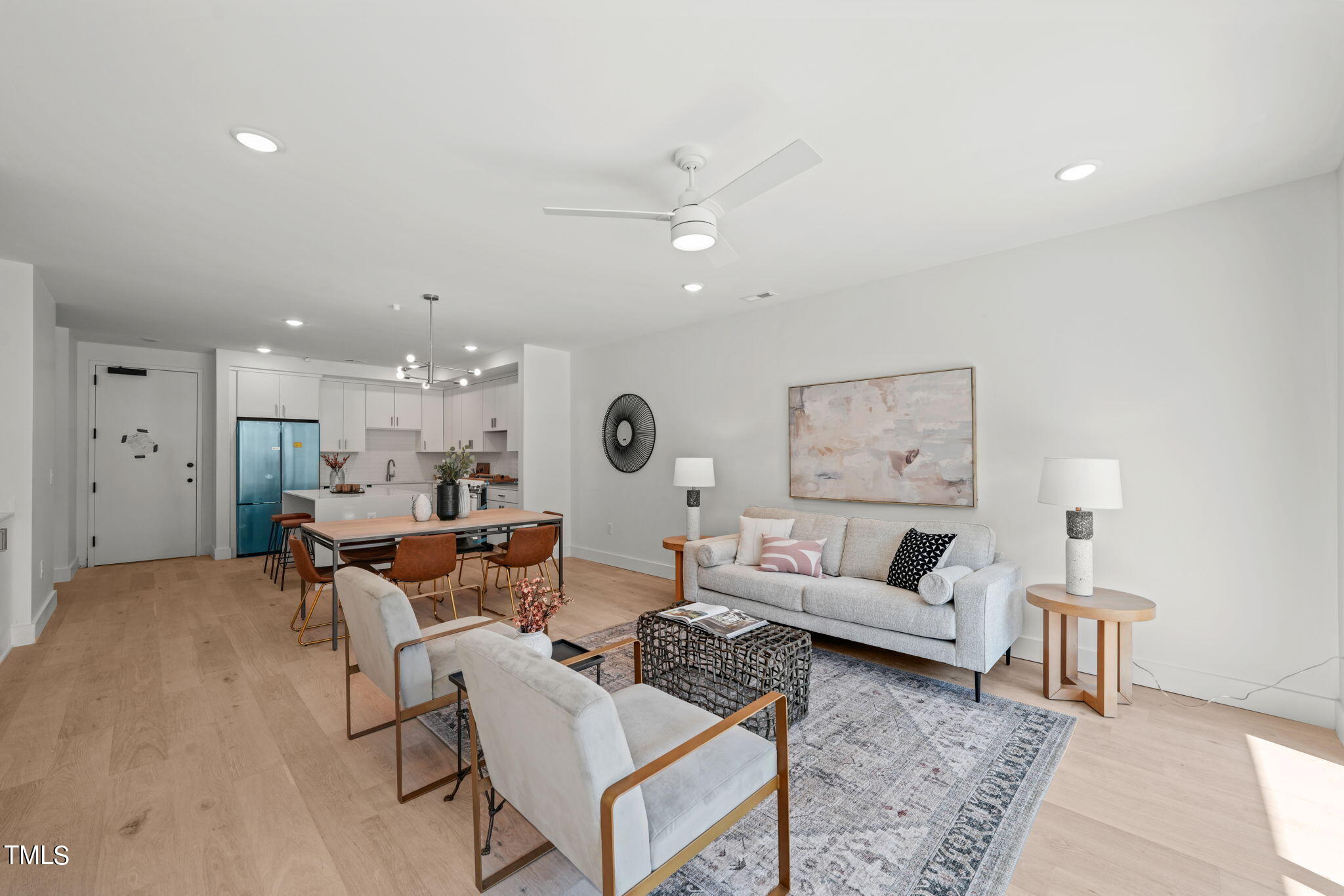 29 Enterprise Street, Unit 305 Raleigh, NC 27607 - Photo 11 of 48 a living room with furniture and a large window