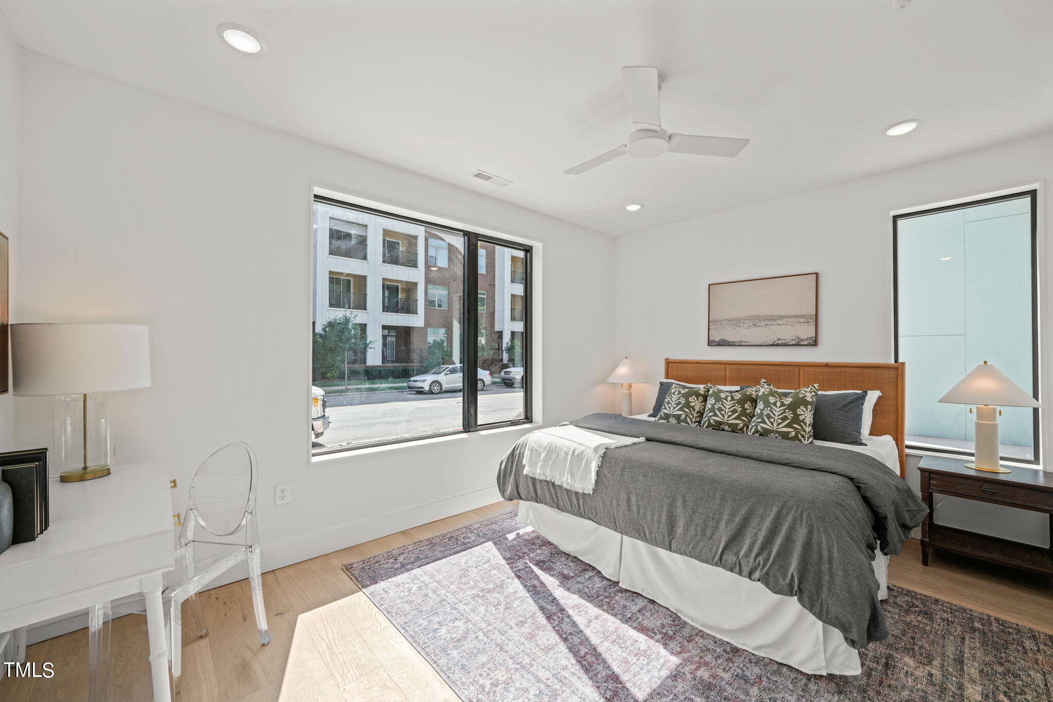 29 Enterprise Street, Unit 305 Raleigh, NC 27607 - Photo 15 of 48 a bedroom with a large bed and a window