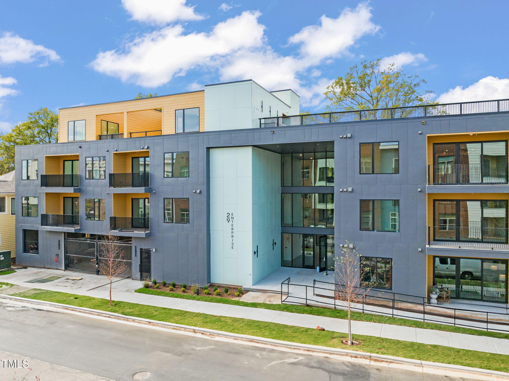 29 Enterprise Street, Unit 305 Raleigh, NC 27607 - Photo 40 of 48 a view of a building with a street
