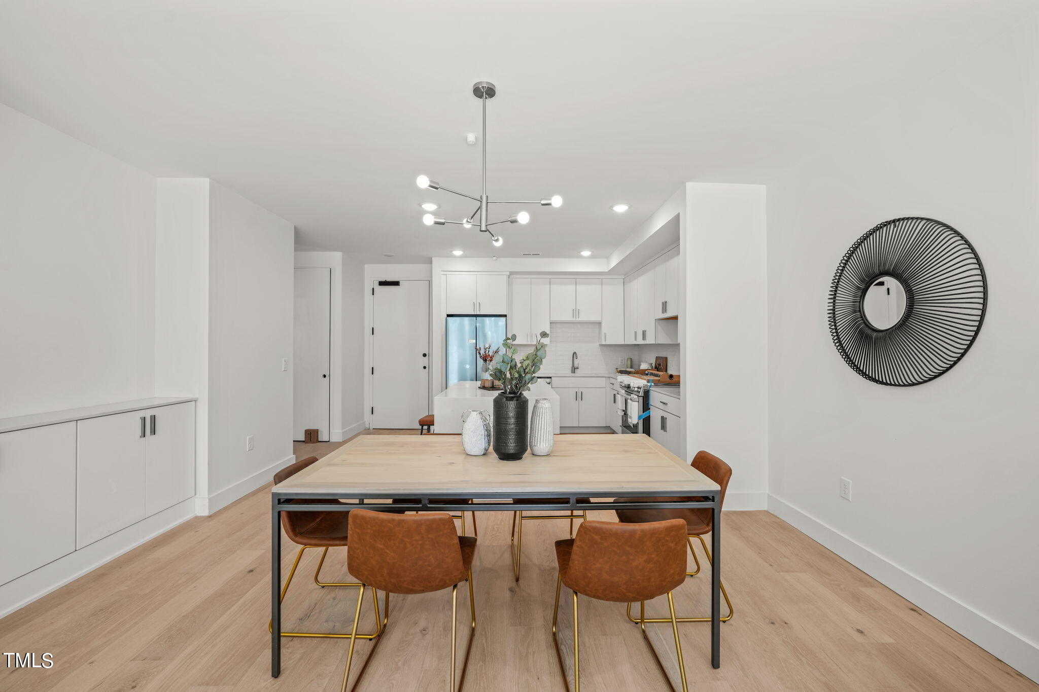 29 Enterprise Street, Unit 305 Raleigh, NC 27607 - Photo 4 of 48 a dining room with furniture and window