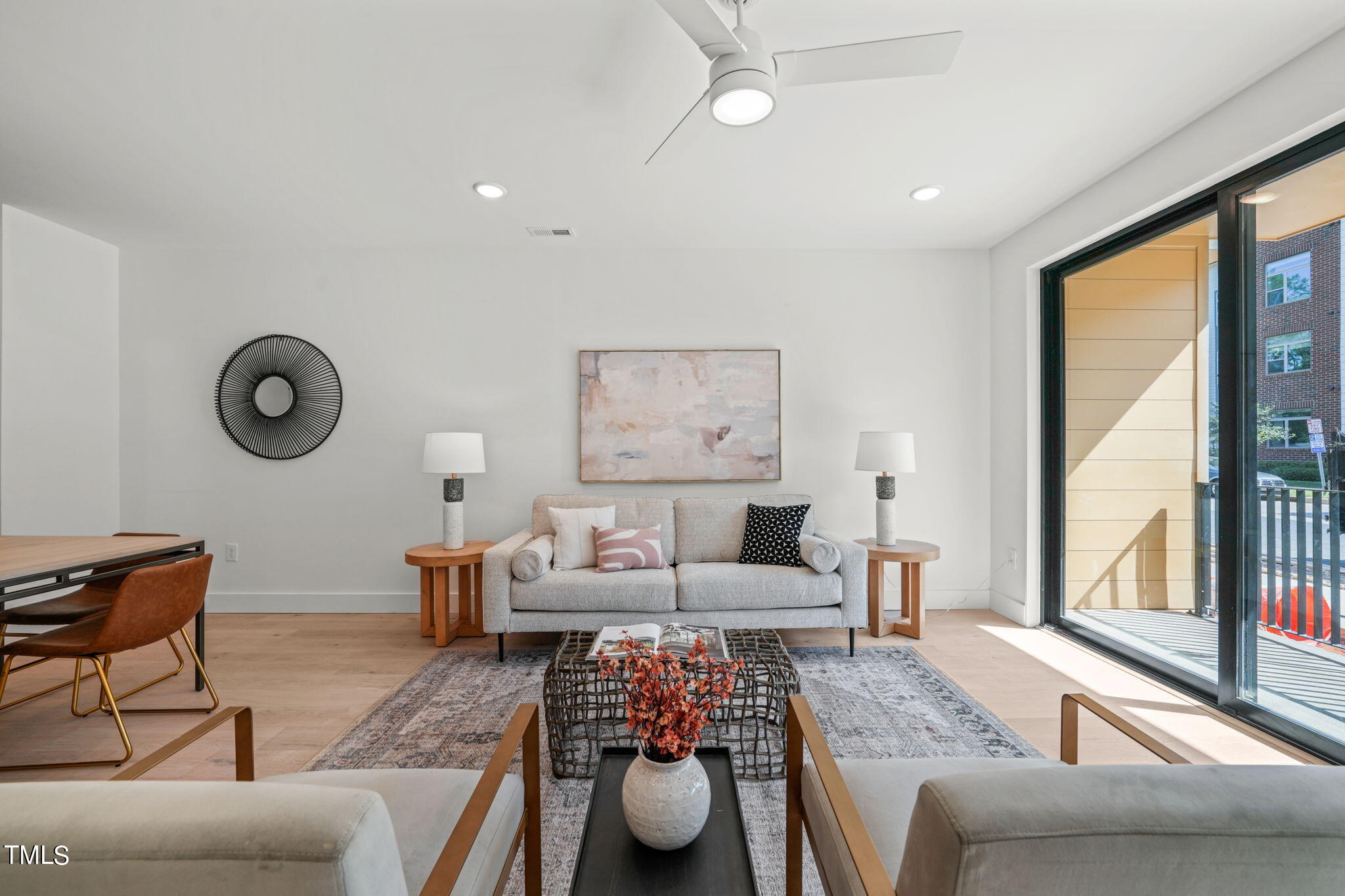 29 Enterprise Street, Unit 305 Raleigh, NC 27607 - Photo 10 of 48 a living room with furniture and a large window