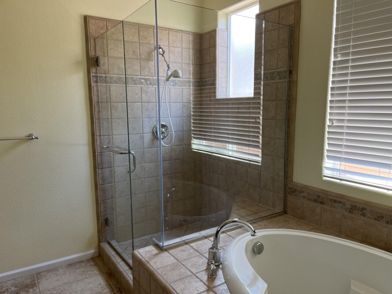 40844 Piazza Del Paradiso Indio, CA 92203 - Photo 13 of 22 a bathroom with a sink and shower