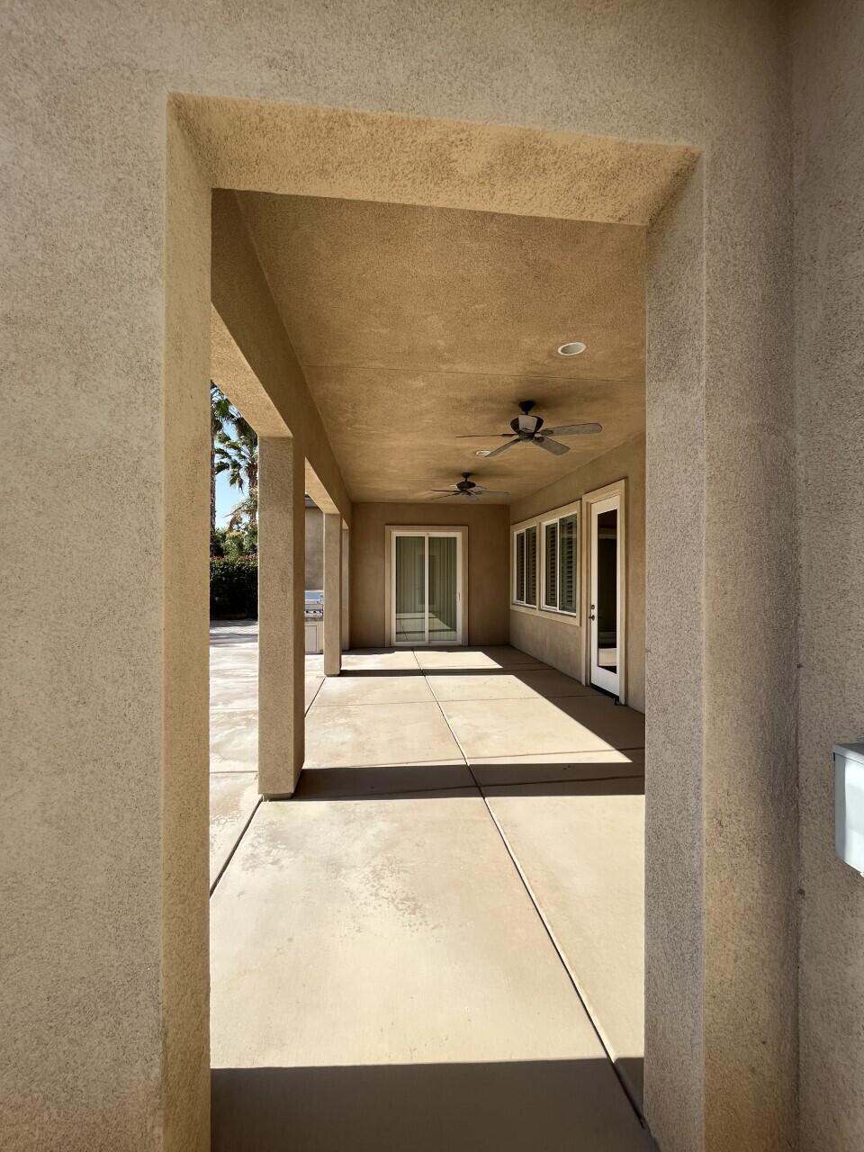 40844 Piazza Del Paradiso Indio, CA 92203 - Photo 20 of 22 a front view of a house with a porch