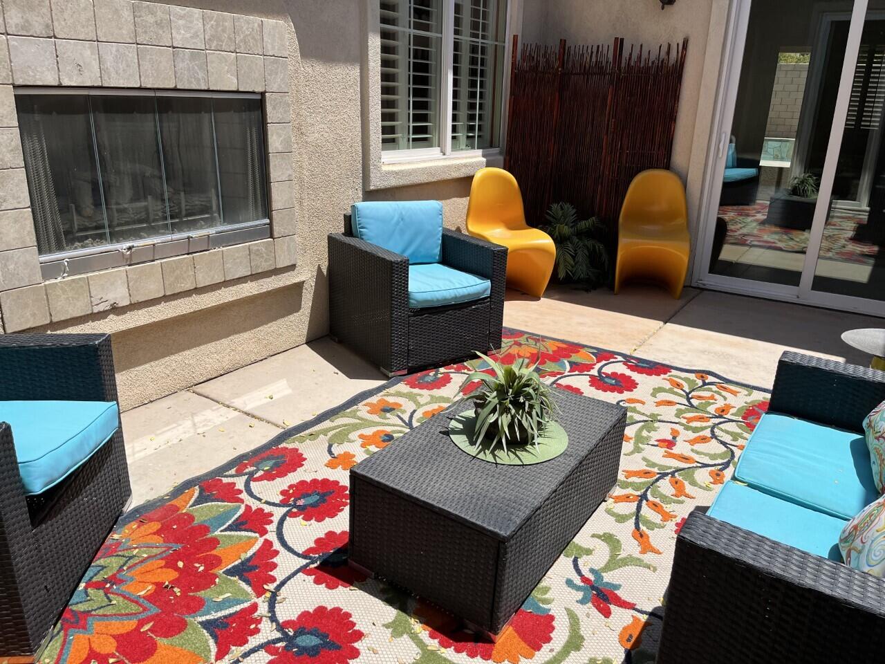 40844 Piazza Del Paradiso Indio, CA 92203 - Photo 4 of 22 a living room with furniture and a rug