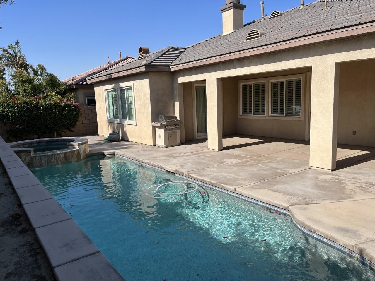 40844 Piazza Del Paradiso Indio, CA 92203 - Photo 7 of 22 a view of pool with outdoor seating