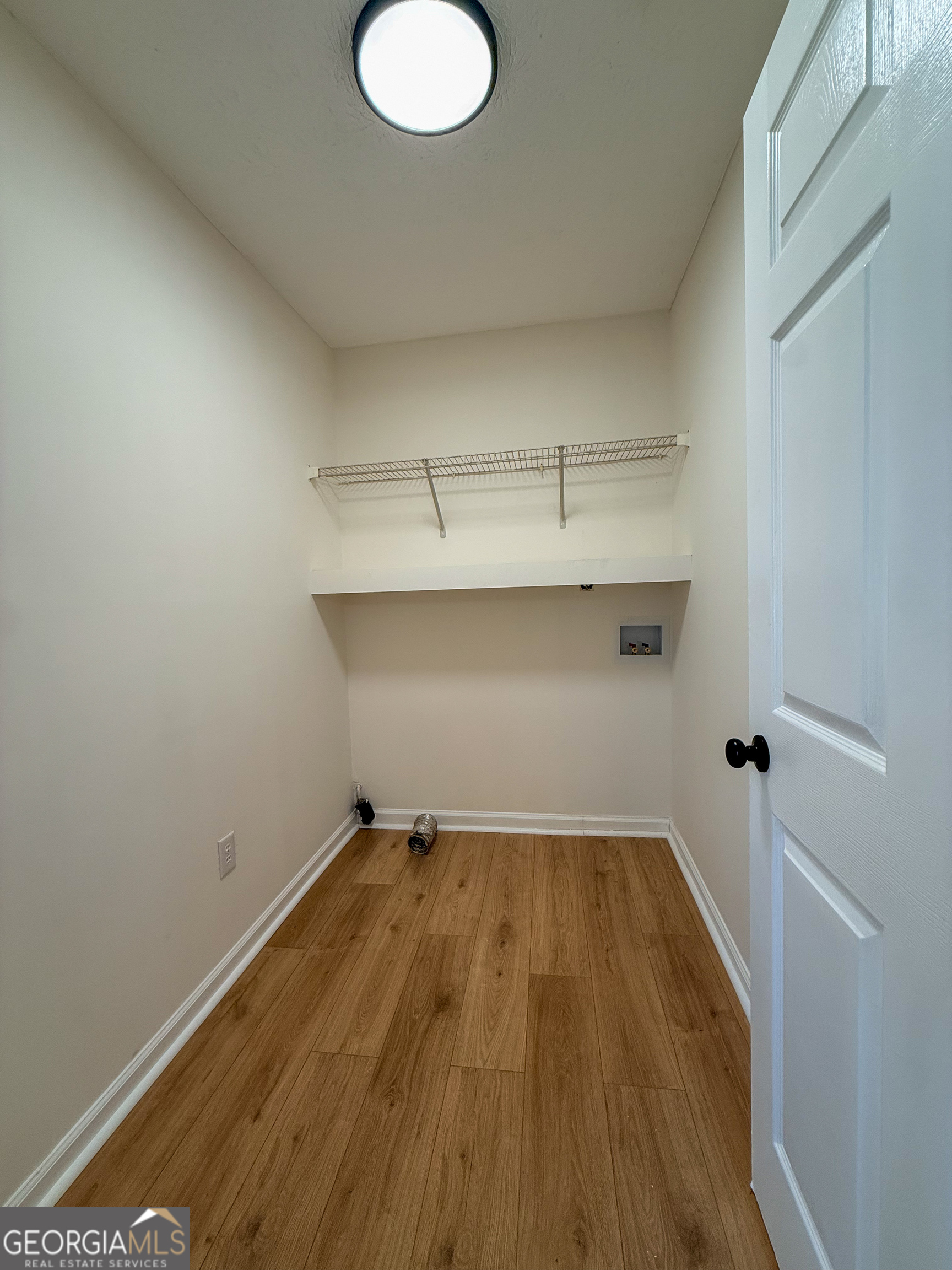 1492 Highway 198 Carnesville, GA 30521 - Photo 10 of 25 a view of a room with wooden floor and sink
