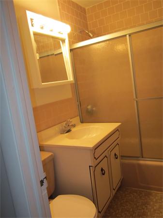 73 Walnut Street, Unit 6 Newton, MA 02460 - Photo 6 of 8 a bathroom with a sink and toilet