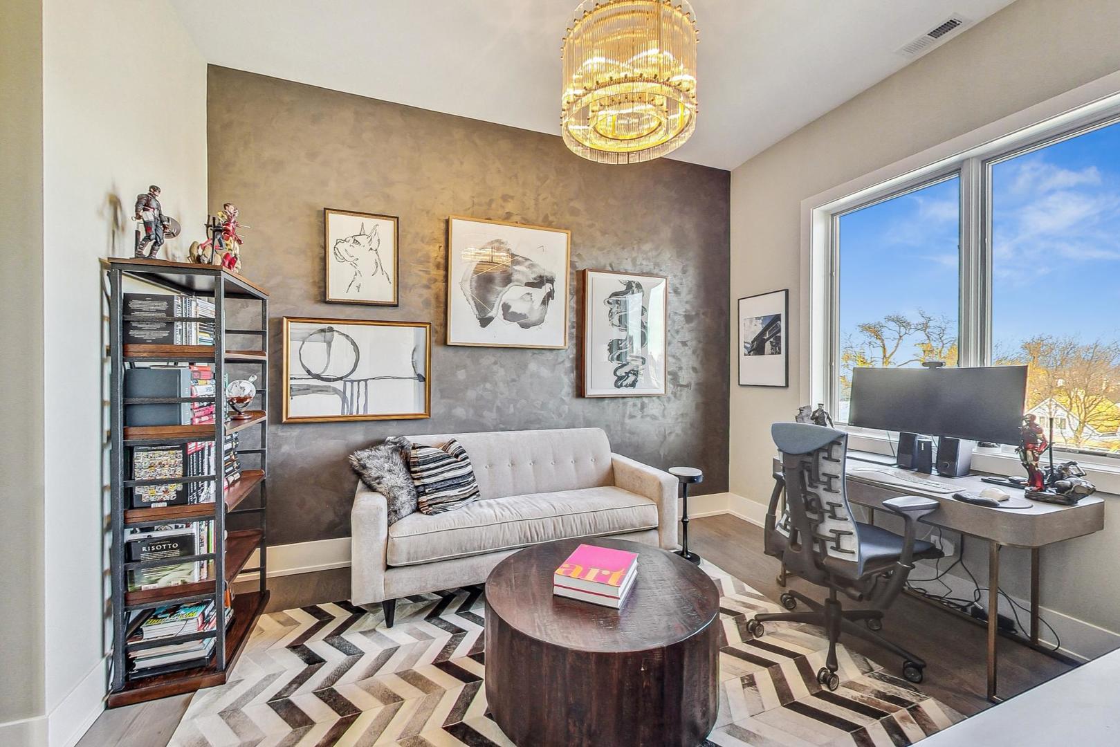 4042 North Pulaski Road, Unit 4E Chicago, IL 60641 - Photo 23 of 32 a living room with furniture and a table