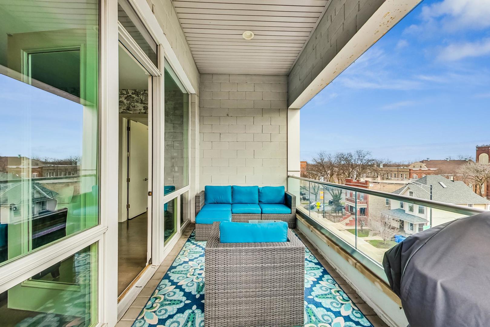 4042 North Pulaski Road, Unit 4E Chicago, IL 60641 - Photo 28 of 32 a view of balcony with couch