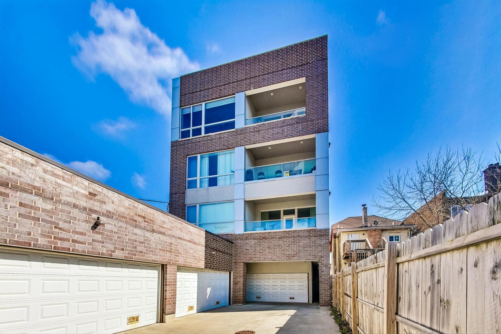 4042 North Pulaski Road, Unit 4E Chicago, IL 60641 - Photo 30 of 32 a building view with a outdoor space