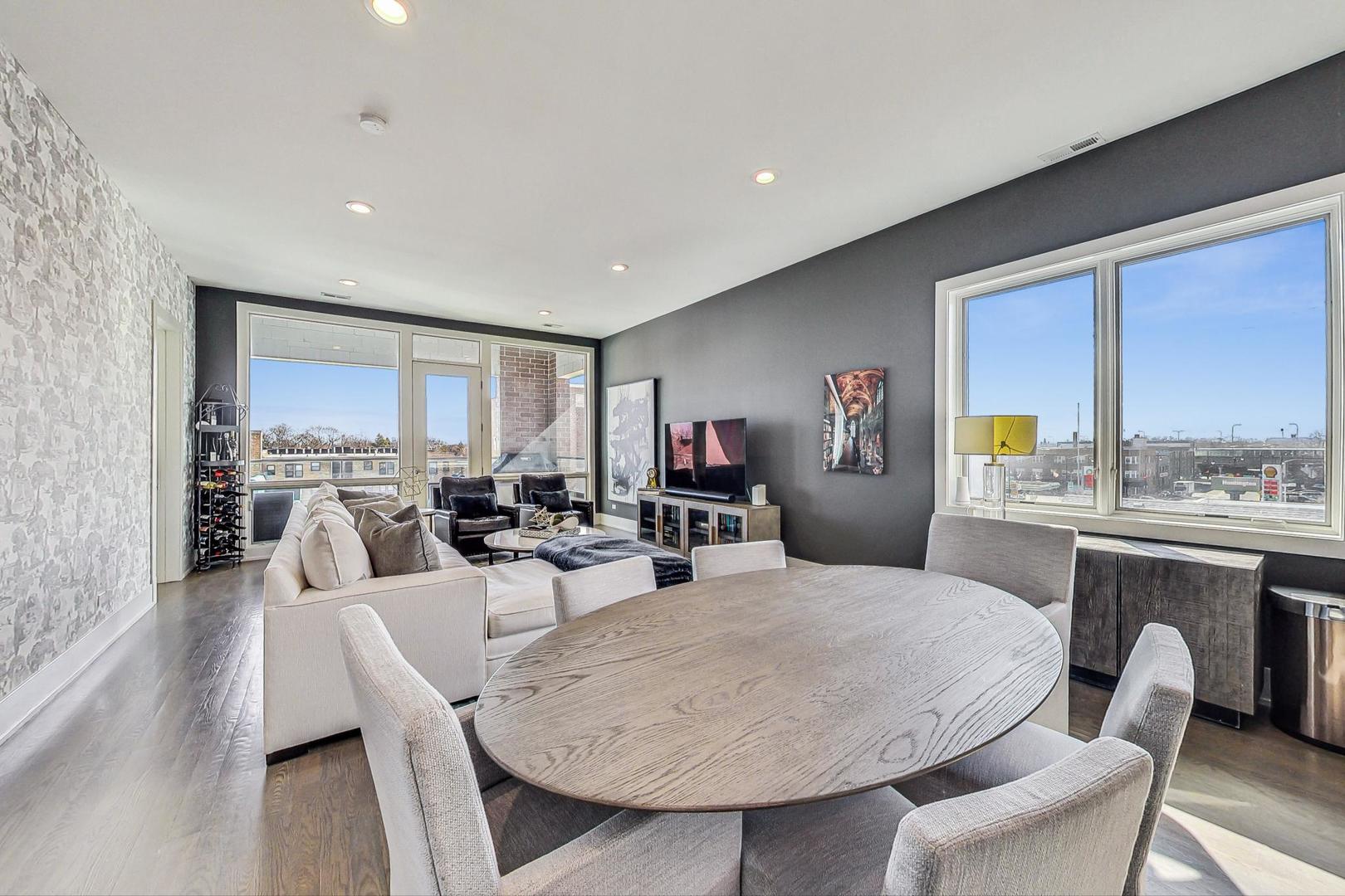 4042 North Pulaski Road, Unit 4E Chicago, IL 60641 - Photo 6 of 32 a view of a dining room with furniture