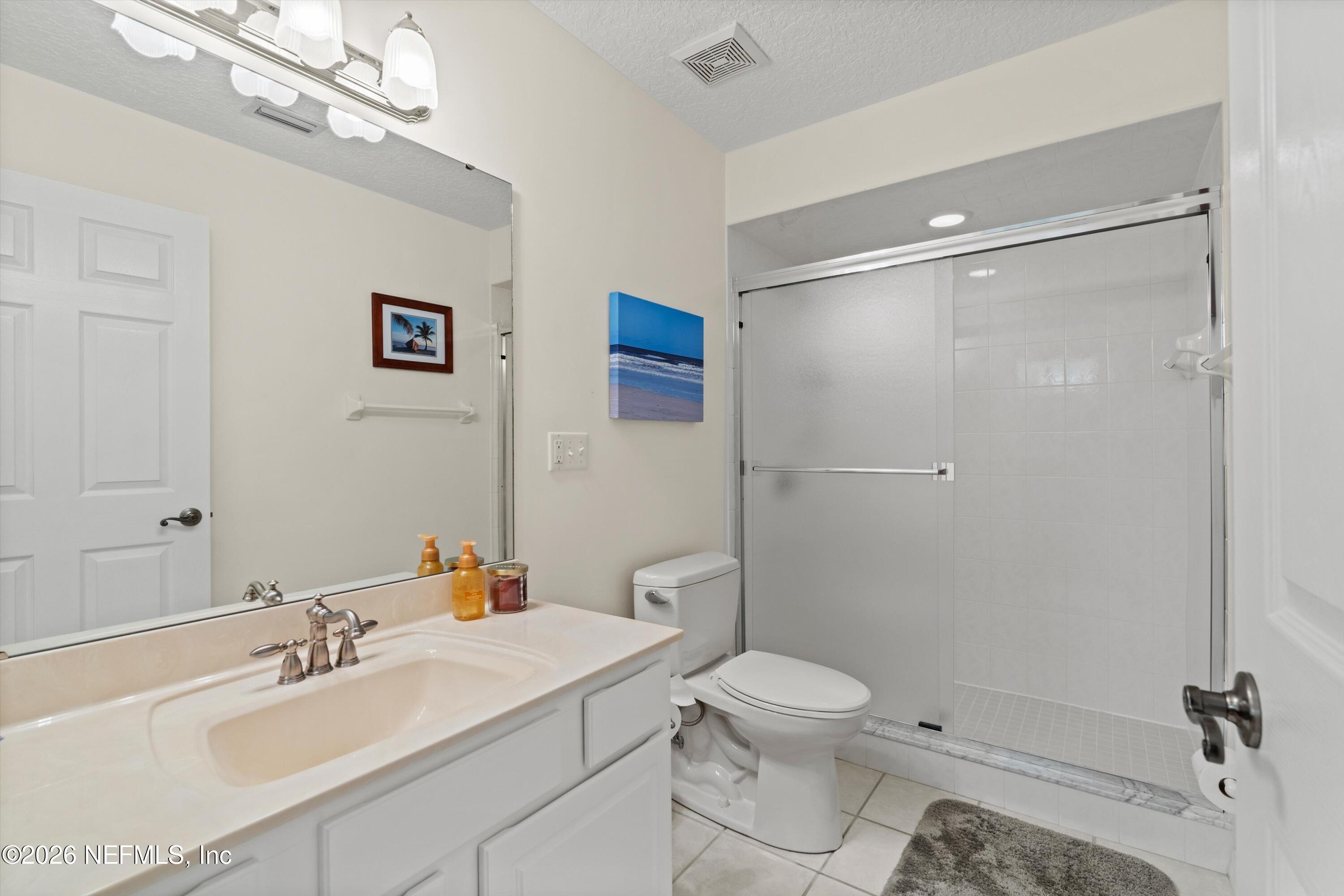 5566 Don Manuel Road Elkton, FL 32033 - Photo 29 of 47 a bathroom with a sink toilet and shower