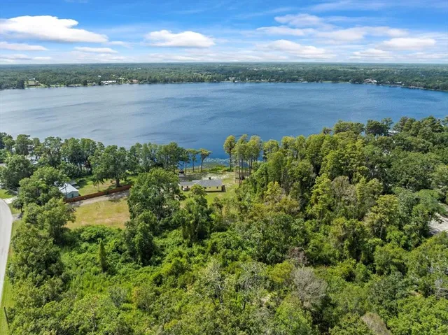 a view of a lake from a yard